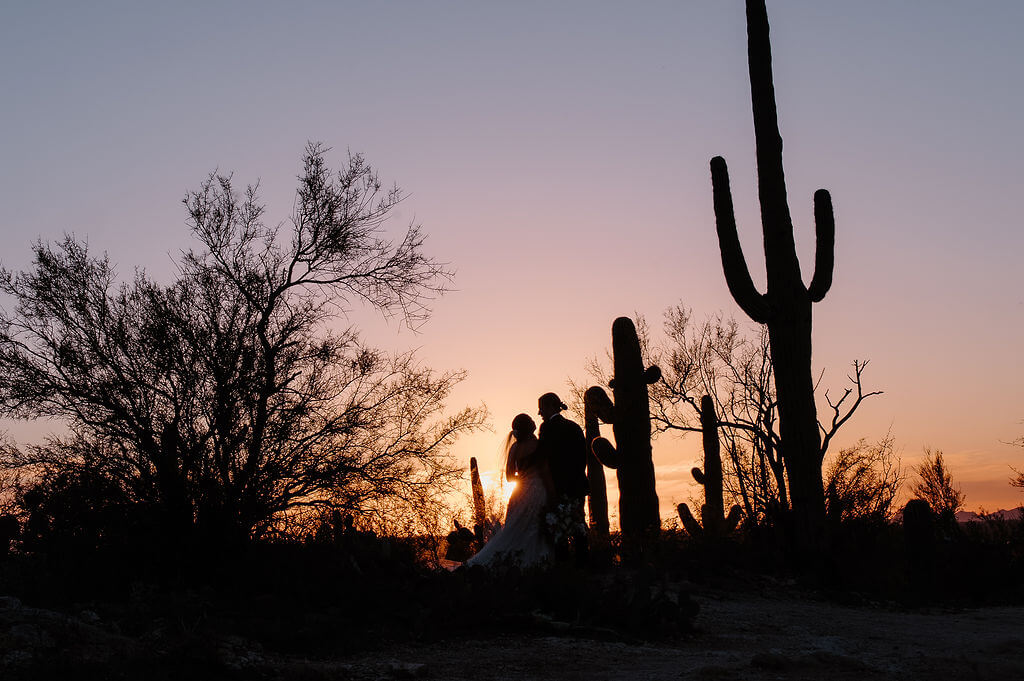 tanque verde ranch wedding venue sunset view desert bride and groom portrait